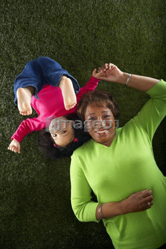 African-Canadian Woman with grand-daughter; Canada, Alberta