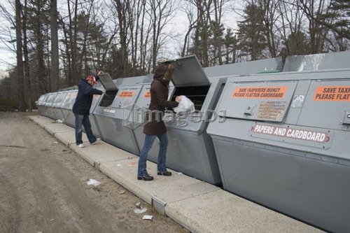 People at community recycling bins; Canada, Ontario