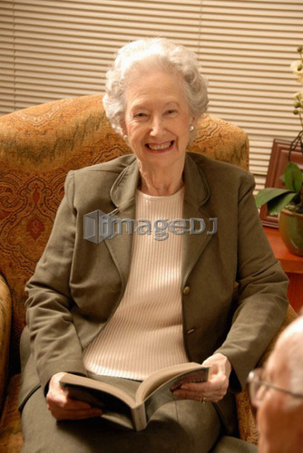 Senior Woman in Armchair; Canada, Saskatchewan, Regina