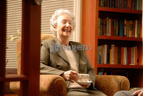 Senior Woman in Library; Canada, Saskatchewan, Regina