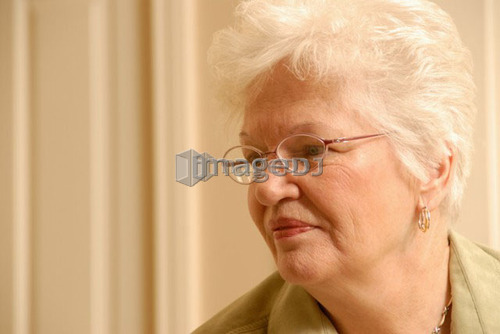 Senior Woman in chair; Canada, Saskatchewan, Regina