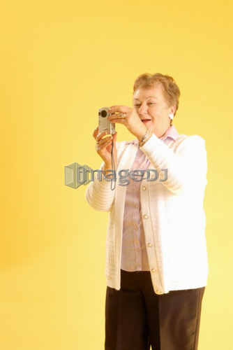 Senior Woman camera; Canada, Saskatchewan, Regina