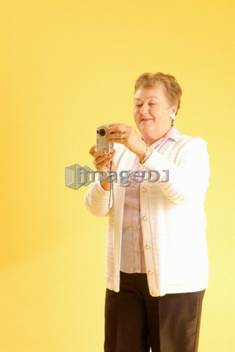 Senior Woman camera; Canada, Saskatchewan, Regina