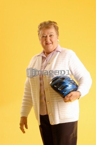Senior Woman bicycle helmet; Canada, Saskatchewan, Regina