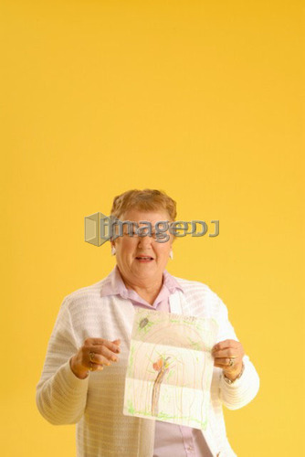 Senior Woman with letter; Canada, Saskatchewan, Regina