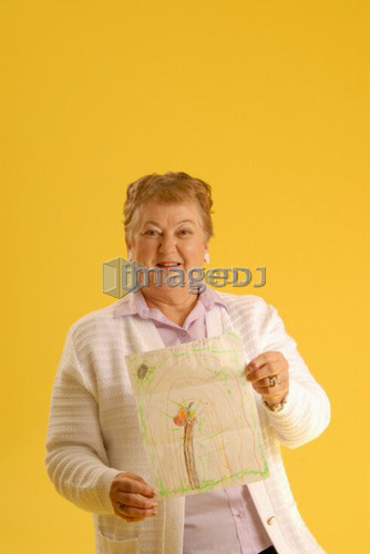 Senior Woman with letter; Canada, Saskatchewan, Regina