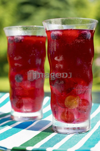 Two glasses of fruit juice , Canada, Ontario