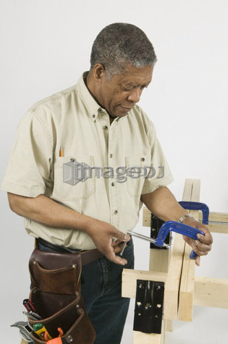 African American Man Doing Home Improvement, Canada, British Columbia