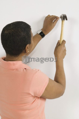 African American Woman Doing Home Improvement, Canada, British Columbia