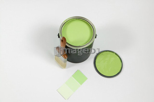 Open paint can, lid, colour swatch and brush, Canada, British Columbia