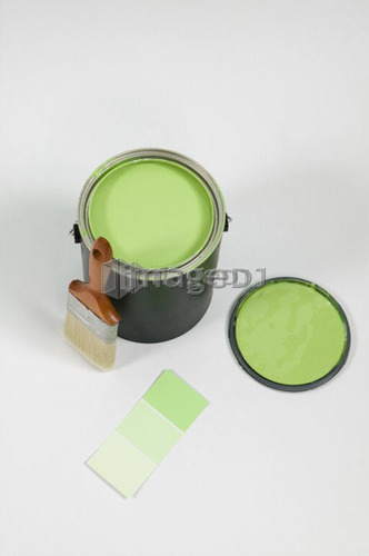 Open paint can, lid, colour swatch and brush, Canada, British Columbia
