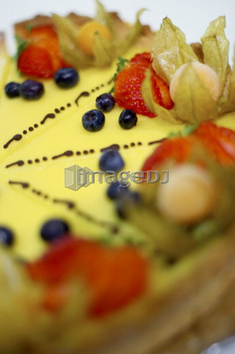 Detail of lemon fruit flan dessert