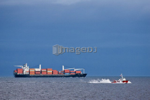 Victoria, BC's pilot boat out returns from a freighter