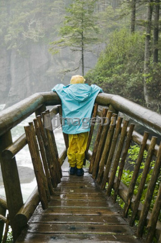 Girl at lookout on Cape Flattery Trail, Washington, USA