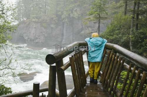 Girl at lookout on Cape Flattery Trail, Washington, USA