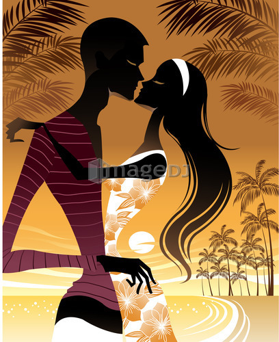 Side view of young couple standing in beach