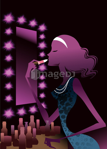 Young woman applying lipstick in mirror