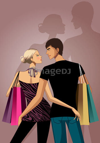 Rear view of Young couple standing with shopping bags against wall