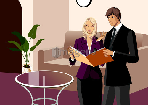 Businessman and businesswoman having discussion, holding file