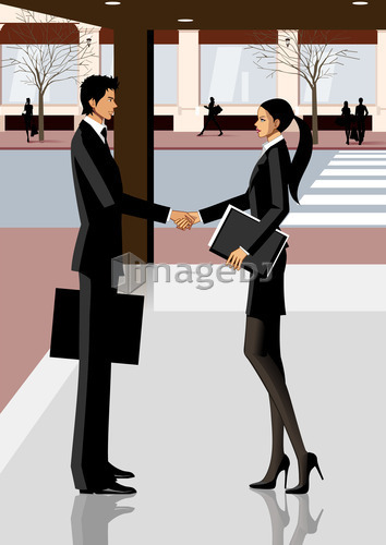 Businesswoman and businessman shaking hands