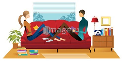 Couple reading books on sofa