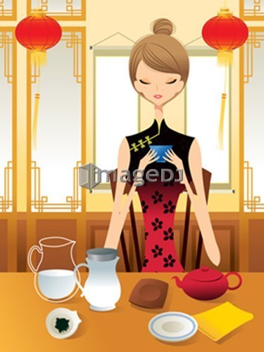 Young woman sitting at breakfast table