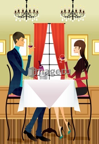 Couple drinking wine at table