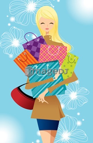 Portrait of teenager girl holding shopping bags