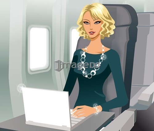 Business woman working with laptop in airplane