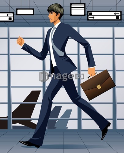 businessman walking briskly