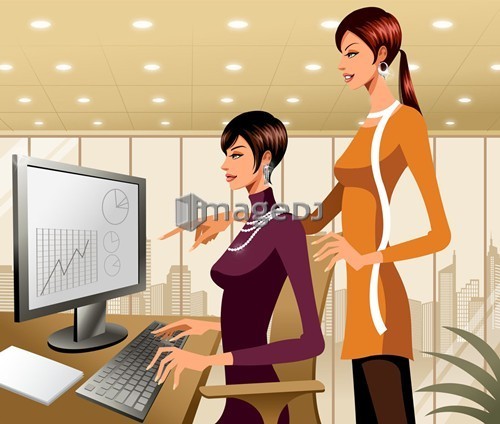 Two businesswomen working at the computer