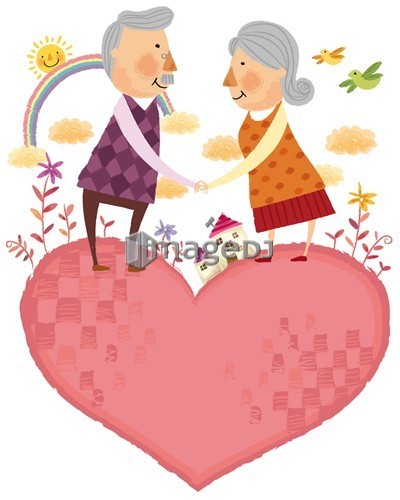 portrait of elderly couple standing on heart shape