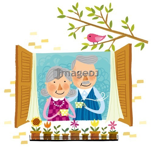 Elderly couple drinking cup of tea beside window