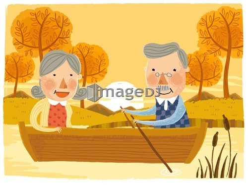 Elderly couple sailing Boat