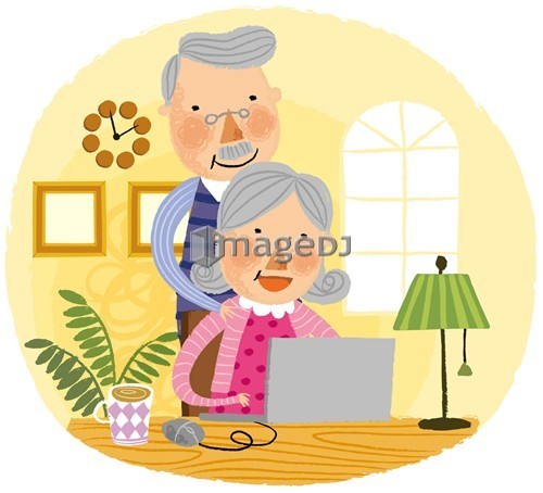 Elderly couple looking at laptop