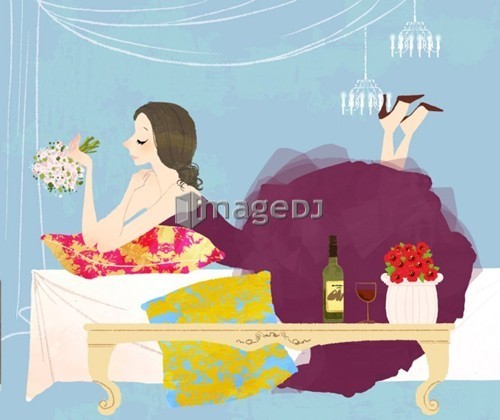 newlywed woman laying on bed holding bouquet of flowers