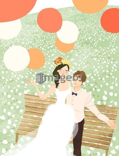 High angle view of newlywed couple sitting on garden bench