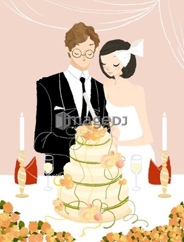 Couple cutting their wedding cake